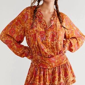 NWOT- Free people til dawn romper size small
